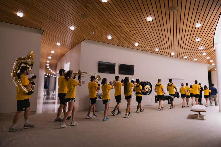 Members of the Hawkeye Marching Band played a critical role in Trisha Brown Dance Company's appearance at Hancher Auditorium