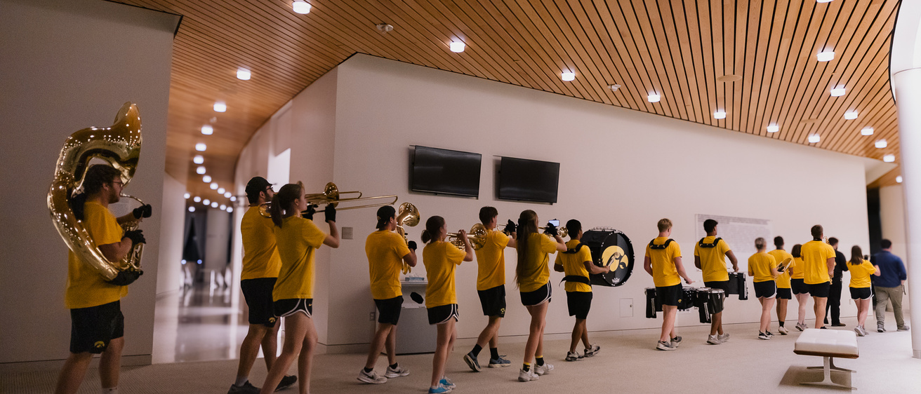 Members of the Hawkeye Marching Band played a critical role in Trisha Brown Dance Company's appearance at Hancher Auditorium